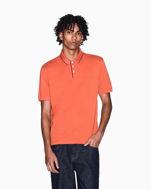Polo de corte regular en punto elástico